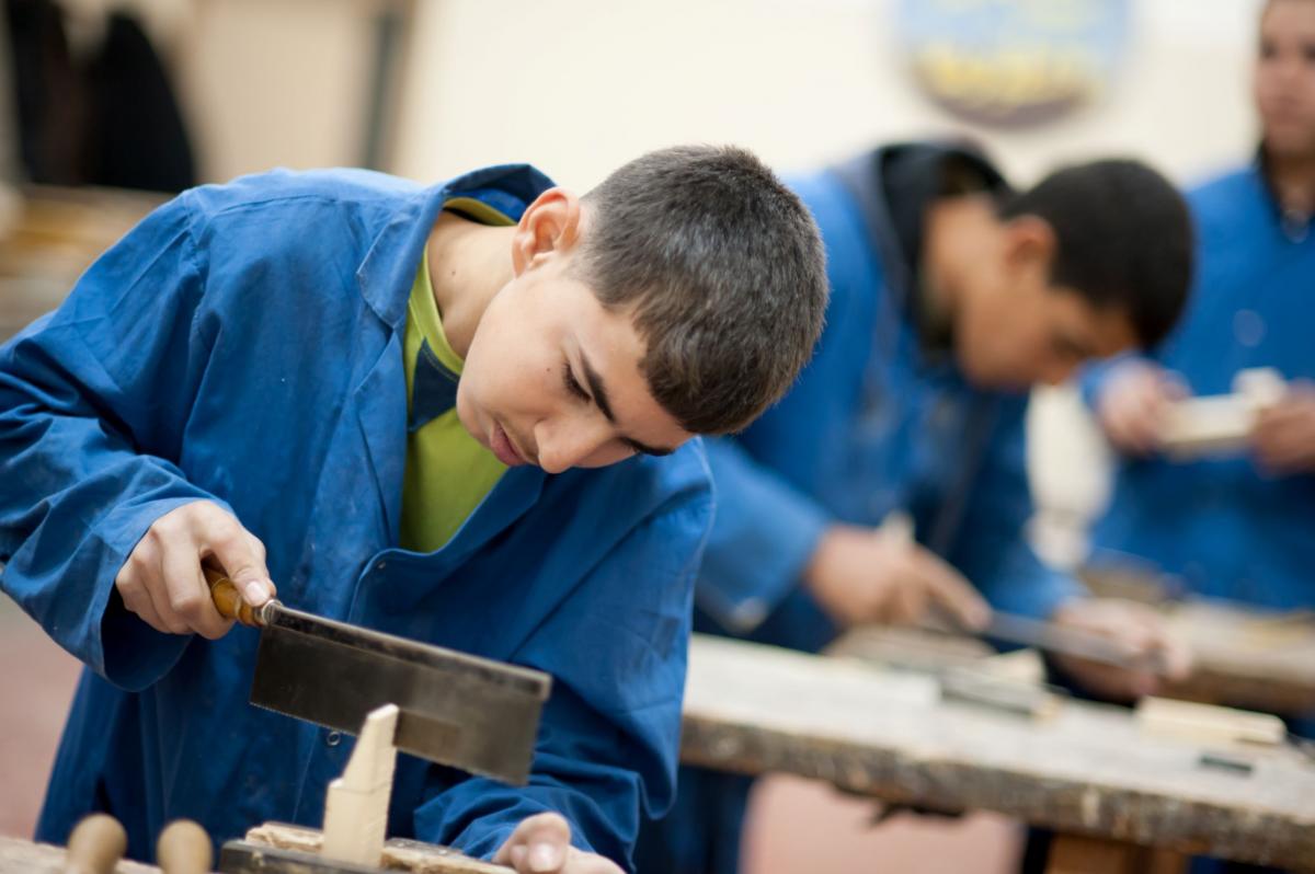 Young man handsaw